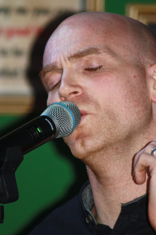 Chris Barron performing live