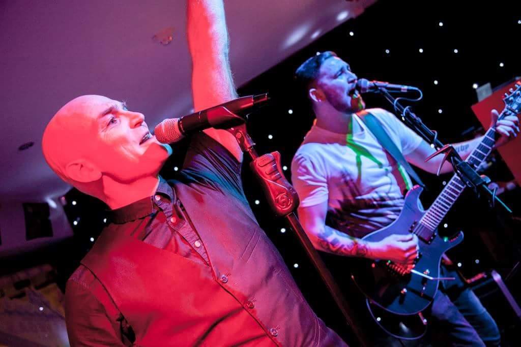 Chris Barron performing live